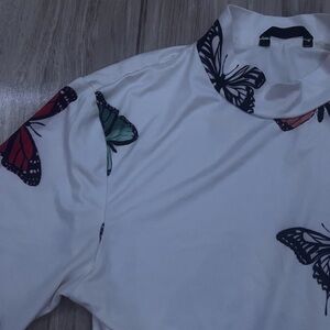 White and multi-coloured butterfly print turtleneck top #butterflyprint